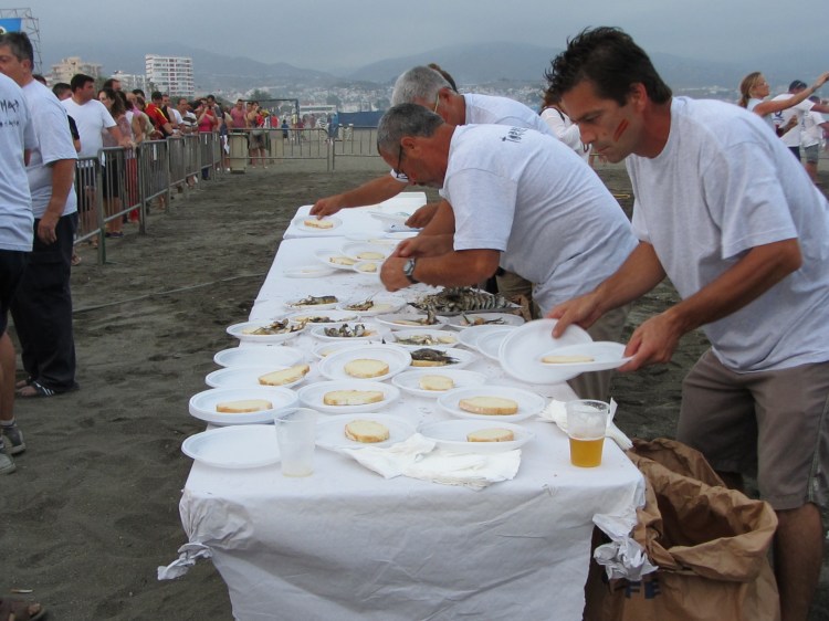 serving the free sardines to everyone