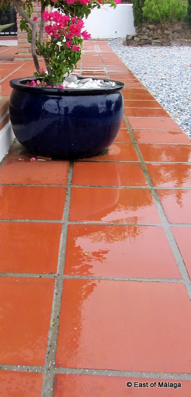 The terrace tiles are wet