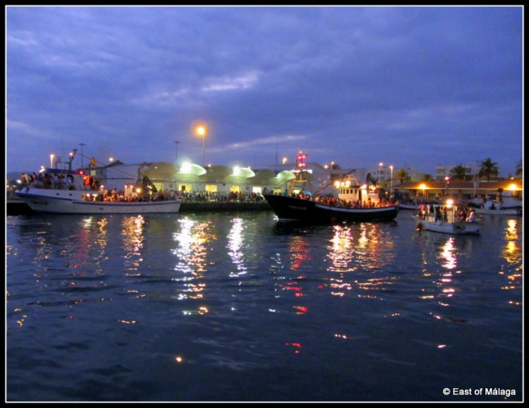 Boats awaiting the arrival of the Virgen del Carmen