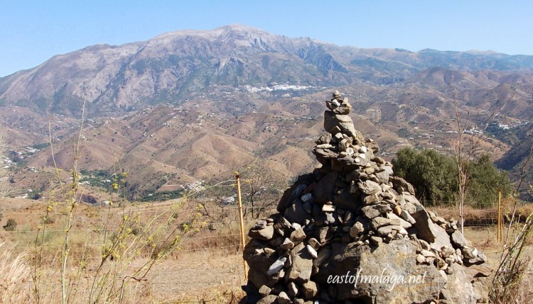 At the entrance to the Buddhist Stupa, with Monte Maroma behind