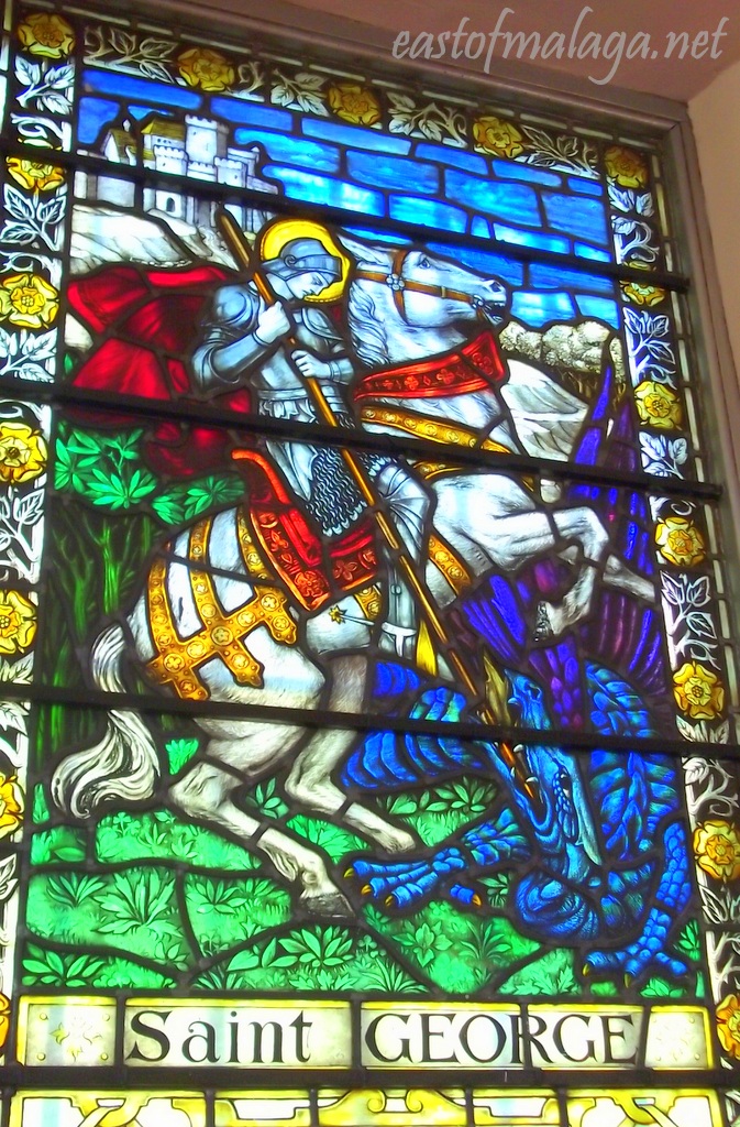 Stained glass window depicting St George slaying the dragon