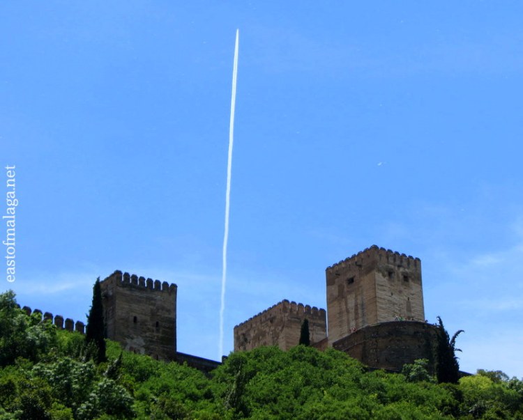 Jet trail over the Alhambra, Granada, Spain
