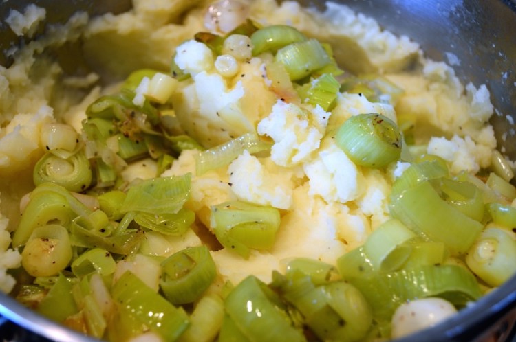Adding the leeks to the mashed potato